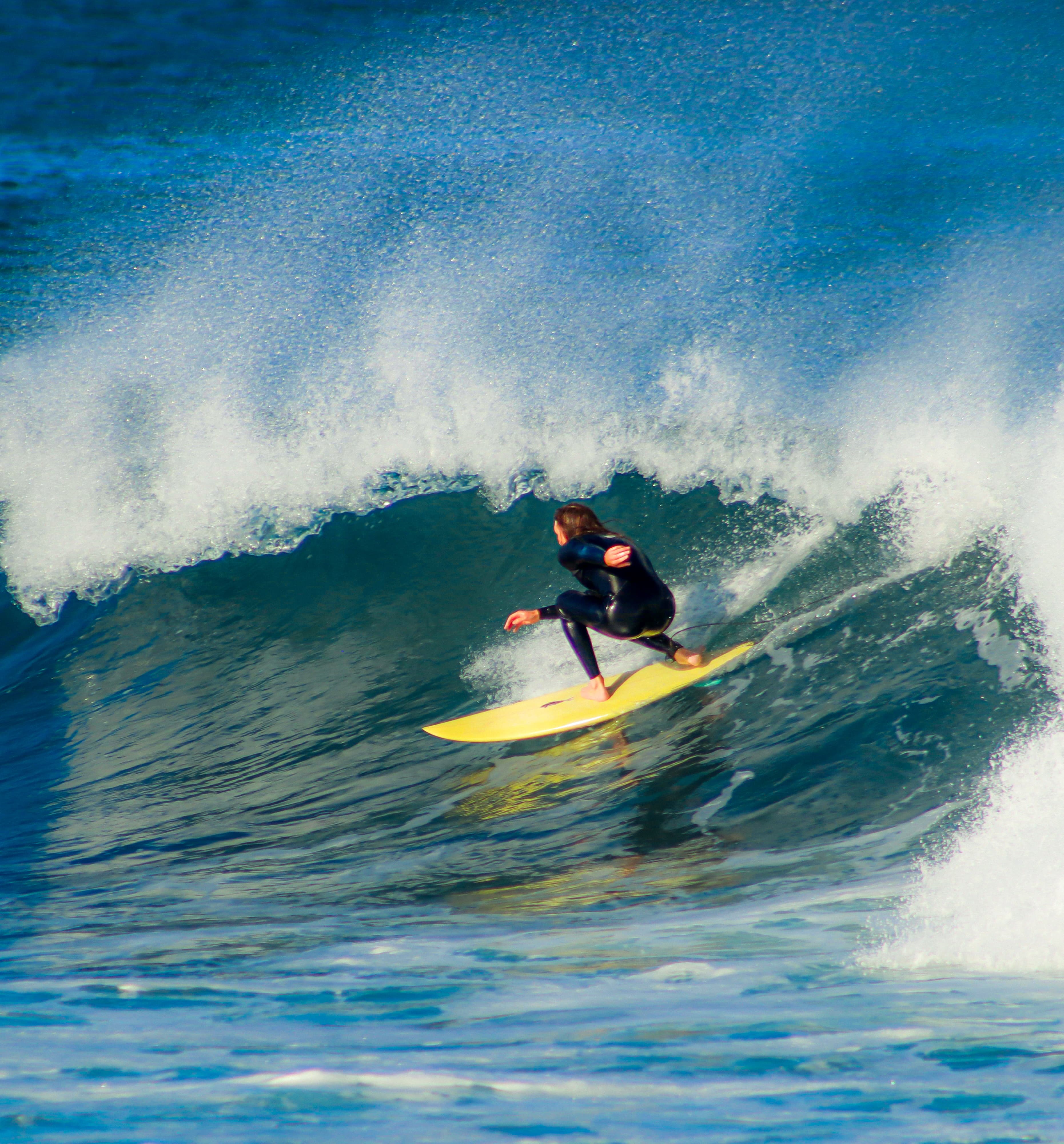 A surfer riding inside a breaking wave, Eastern Cape