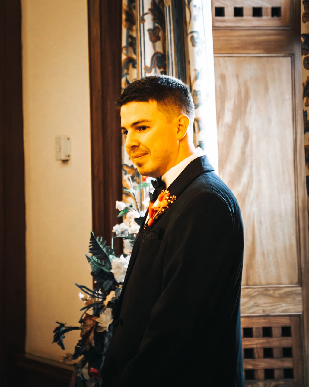 The groom, in quiet thought, before the ceremony