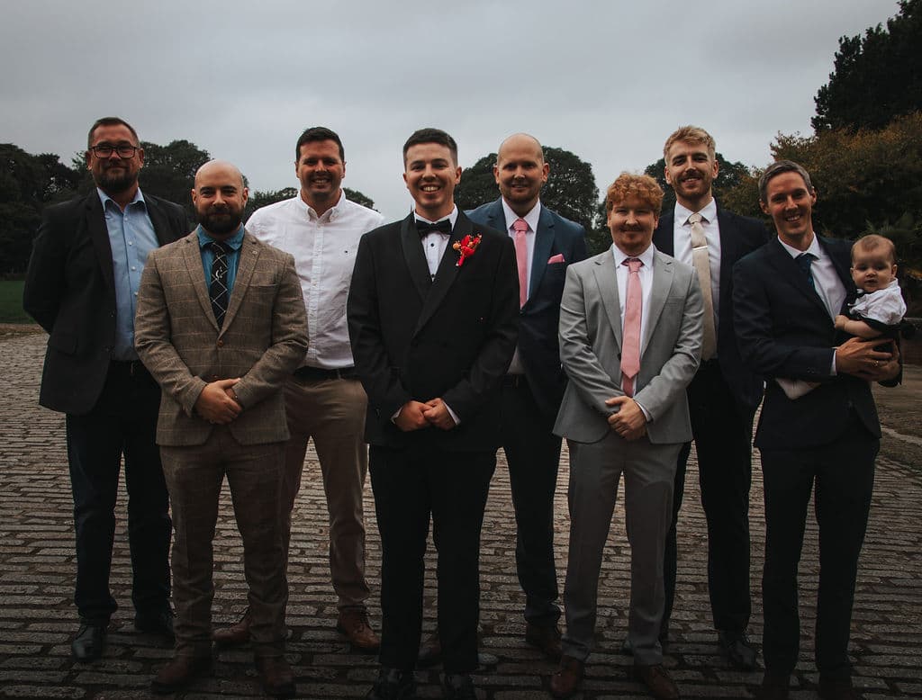 The groomsmen, gathered outside before the day begins